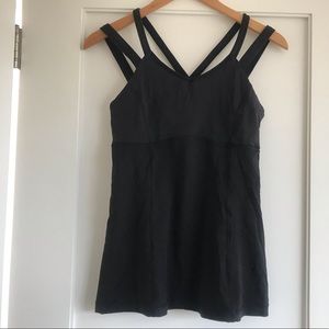 Black strappy lululemon tank top with shelf bra